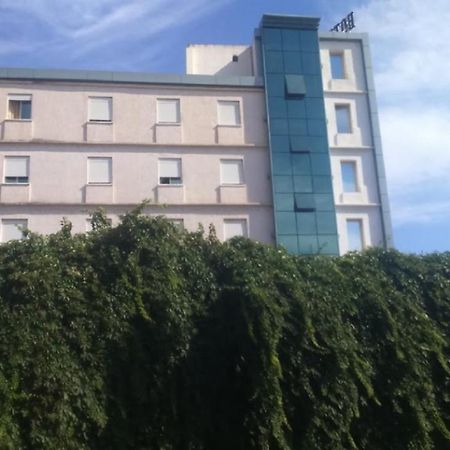 Roza Hotel Bab-Ezzouar ภายนอก รูปภาพ