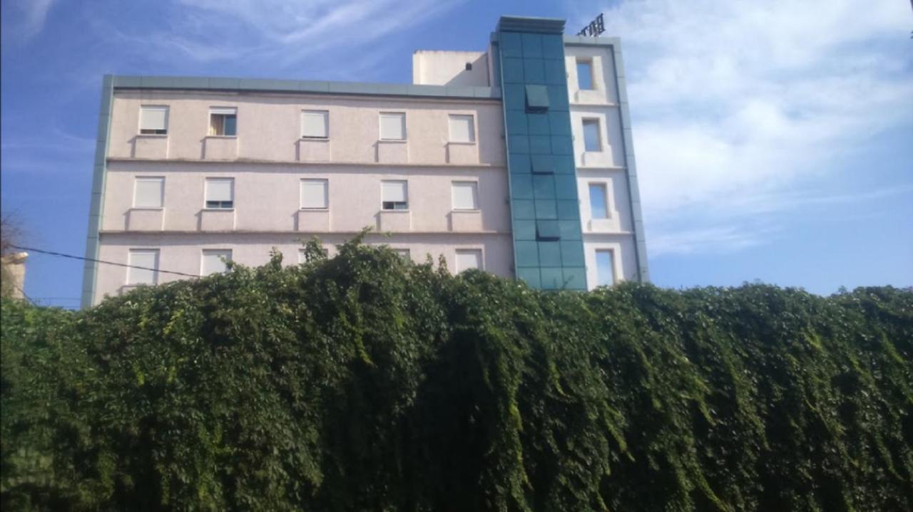 Roza Hotel Bab-Ezzouar ภายนอก รูปภาพ